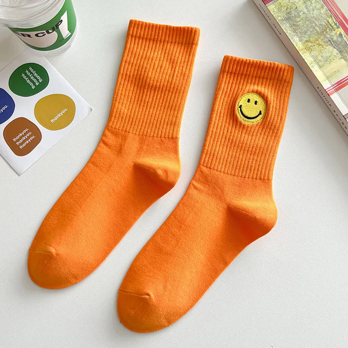 solid-color-medium-tube-socks-for-womens-fresh-smiling-face-pattern-simple-style-comfortable-breathable-girl-socks