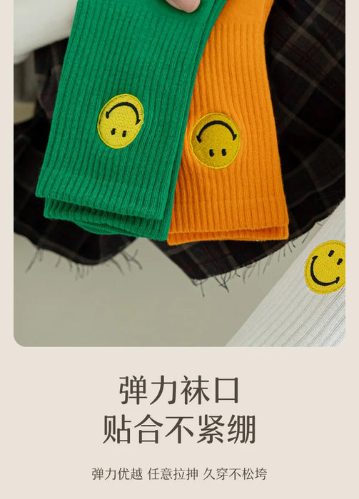 solid-color-medium-tube-socks-for-womens-fresh-smiling-face-pattern-simple-style-comfortable-breathable-girl-socks