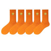 solid-color-medium-tube-socks-for-womens-fresh-smiling-face-pattern-simple-style-comfortable-breathable-girl-socks
